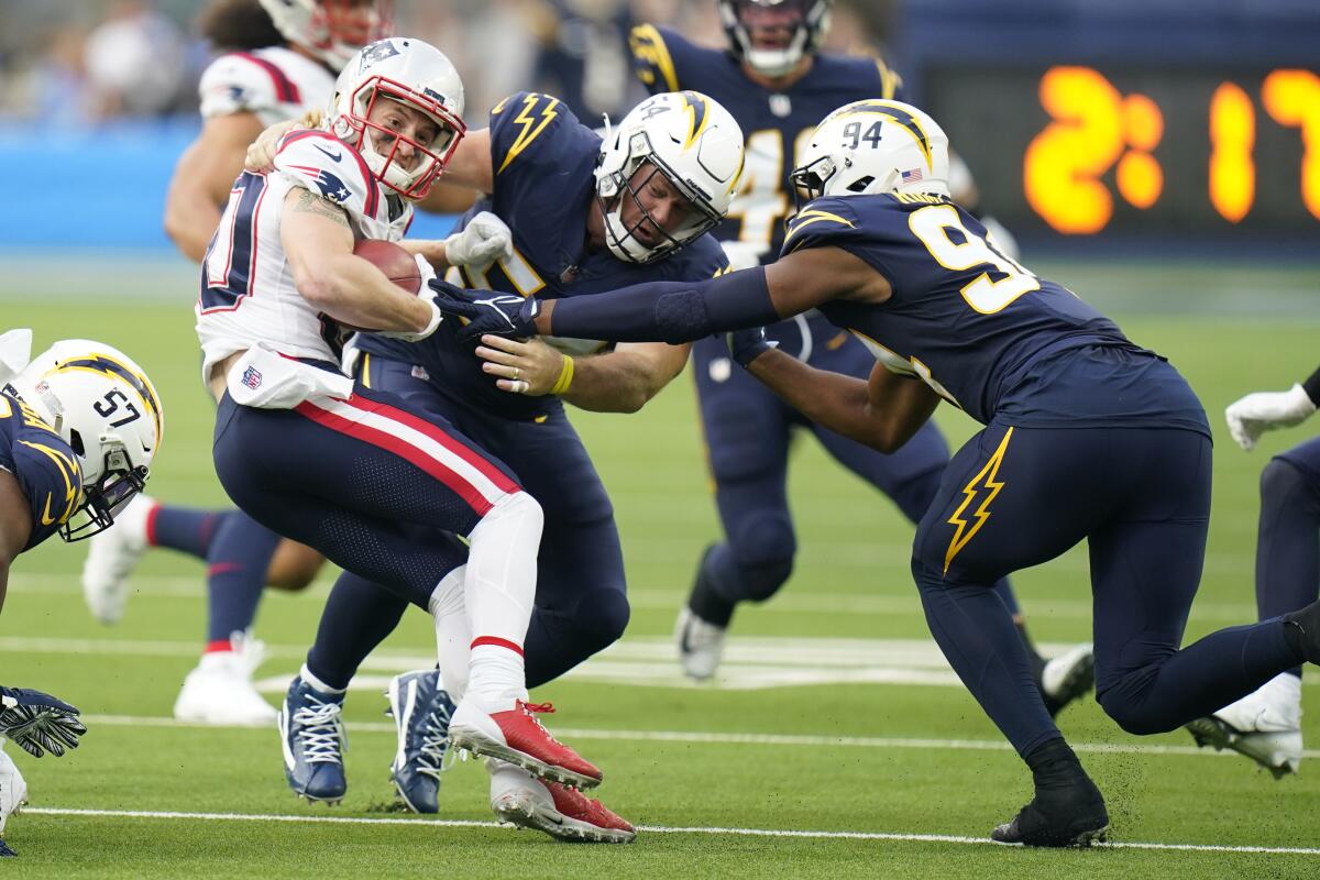 Patriots returner Gunner Olszewski is finally tackled by the Chargers.