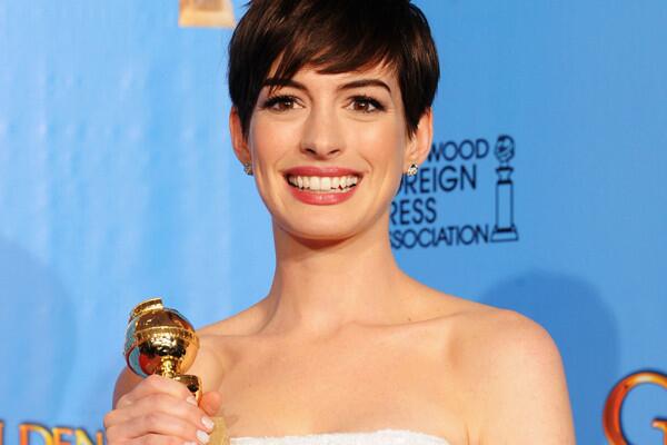 Anne Hathaway, winner for supporting actress in a comedy or musical ('Les Miserables')