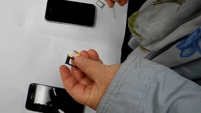 Swapping out a SIM card on an iPhone 4s or an iPhone 5 isn't difficult, but you do need to know where to find that card tray.