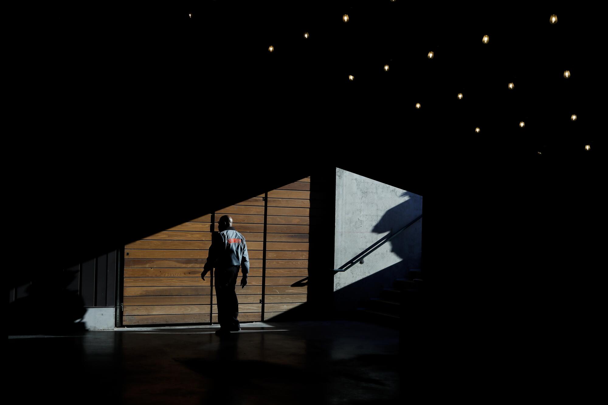 A San Francisco Giants' security guard walks around the stadium before Game 5.