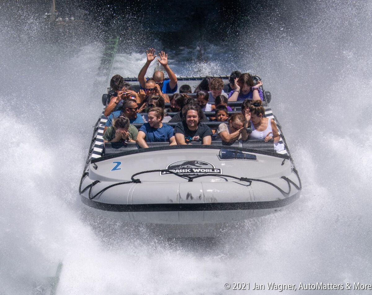 Massive splash at the bottom of the waterfall on “Jurassic World—The Ride”