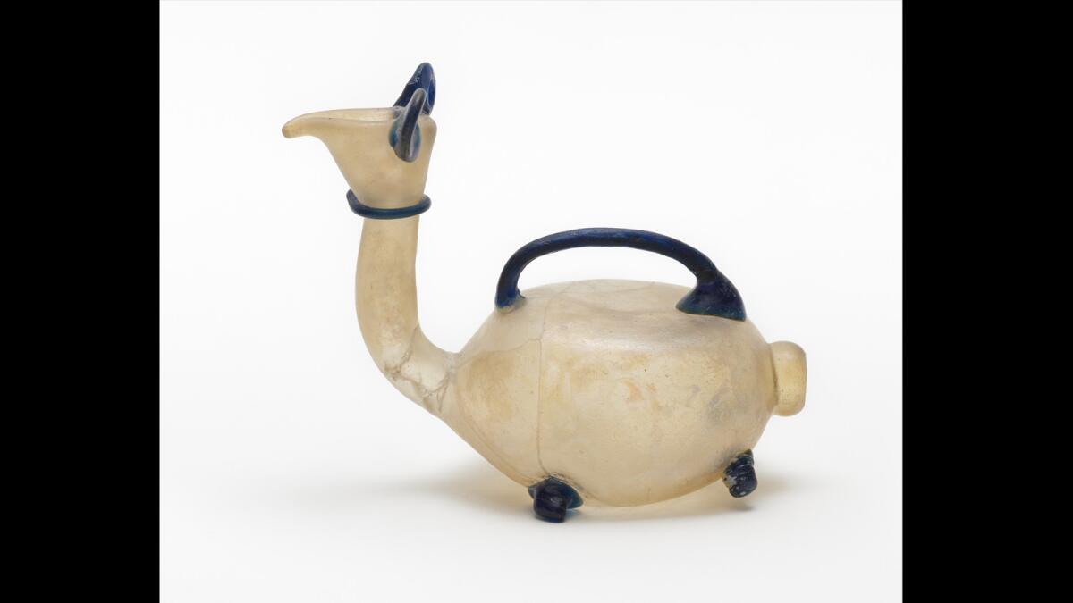 A delicate, blown-glass vessel made in Iran in the 10th century likely once held perfume. The piece is part of LACMA's collection of Islamic art, one of the most important in the world.
