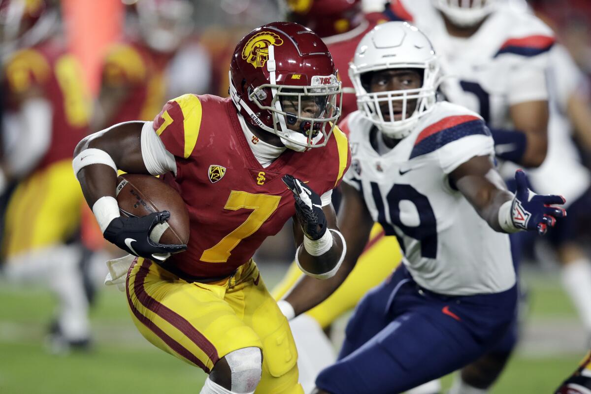 USC running back Stephen Carr carries the ball against Arizona.