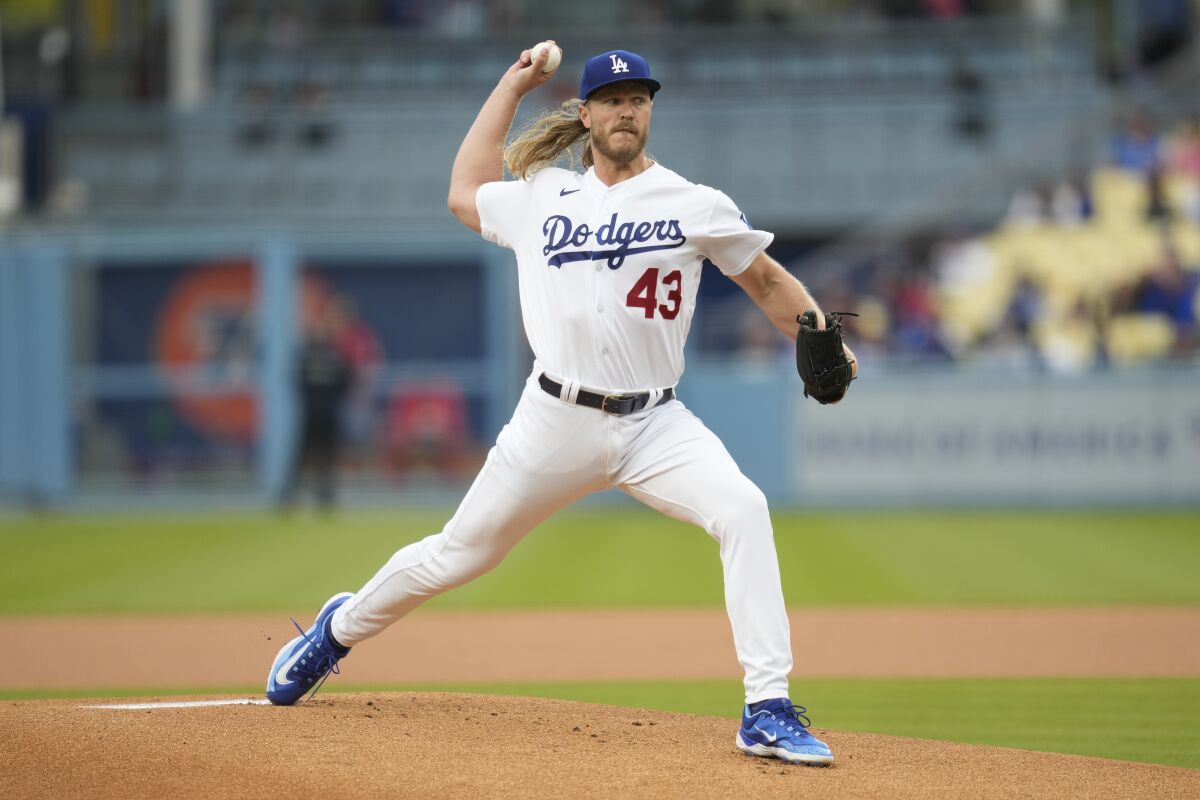 Los Angeles Dodgers pitcher Noah Syndergaard throws during the first inning.