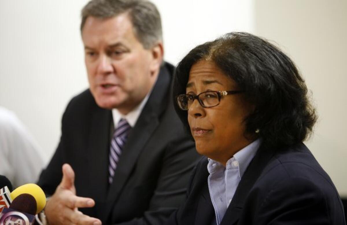 Los Angeles City Councilwoman Jan Perry and Tim Leiweke, left, former chief executive of AEG, attend a City Council meeting last year. Perry, chair of a special City Council committee overseeing the AEG deal, said she remains hopeful that the city can continue to work with the entertainment giant in both drawing an NFL franchise and building the stadium in the L.A. Live area.