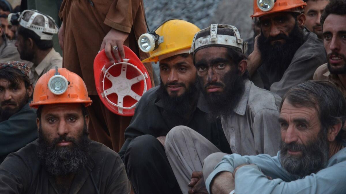 Coal miners wait for the recovery of their colleagues in Quetta, Pakistan.