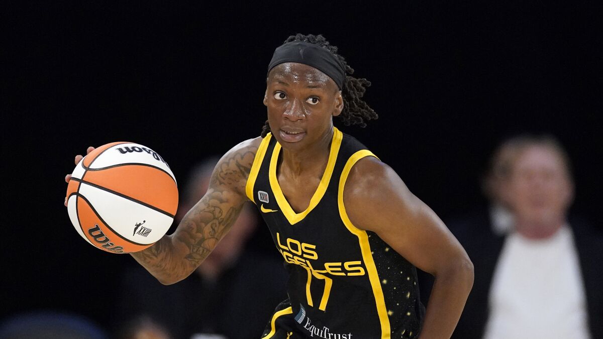 Erica Wheeler dribbles during the first half of a recent game.