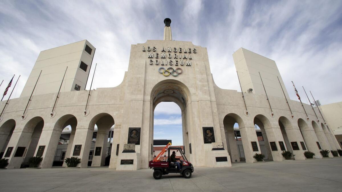 USC's sale of naming rights for Los Angeles Memorial Coliseum is being criticized as dishonoring the historic stadium's dedication as a memorial to soldiers who fought and died in World War I.