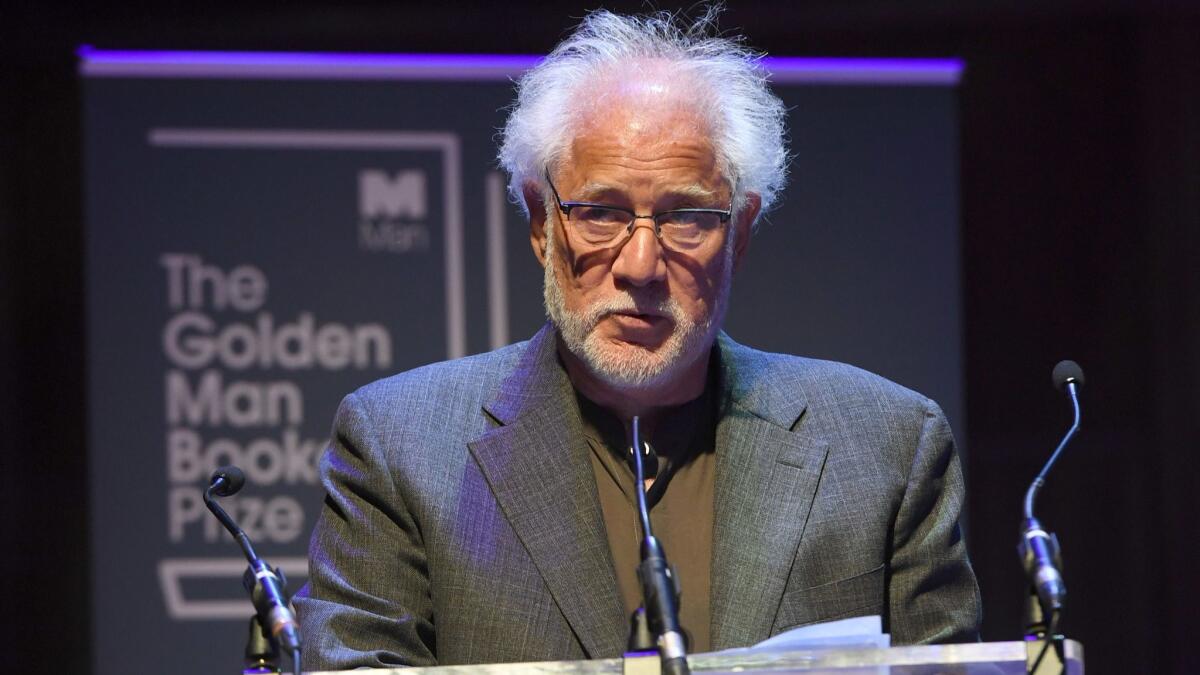 Michael Ondaatje speaks Sunday after winning the Golden Man Booker Prize for his novel "The English Patient" at the Royal Festival Hall in London.