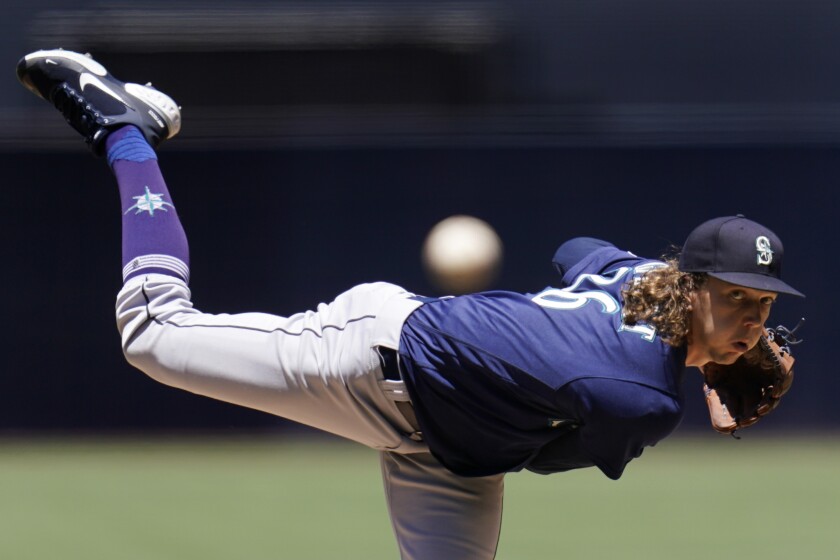 Seattle Mariners starting pitcher Logan Gilbert works against a San Diego Padres batter during the first inning of a baseball game Tuesday, July 5, 2022, in San Diego. (AP Photo/Gregory Bull)