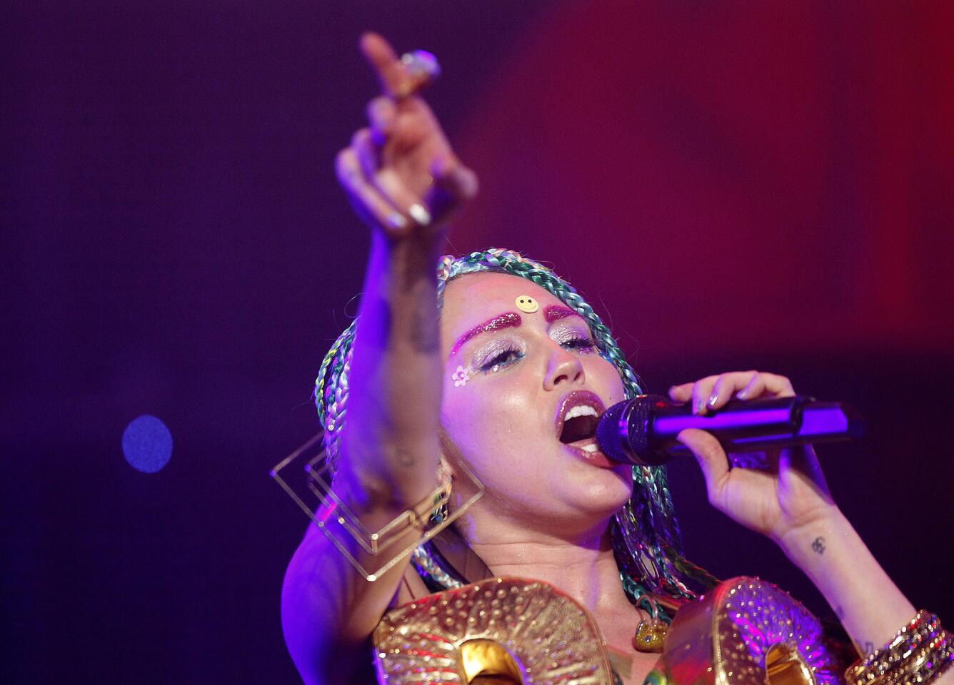 Miley Cyrus performs during her eye-popping, two-hour production at the Wiltern Theatre in Los Angeles