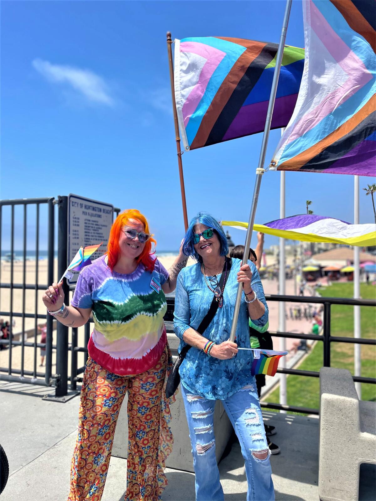 Former Huntington Beach resident Ashley Williamson, left, with Laguna Beach's Sally Sanders at the Huntington Beach Pier.