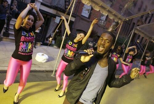 Choreographer JaQuel Knight leads a group of dancers in a performance of "The Barbie" dance routine during the Teen Vogue Block Party.