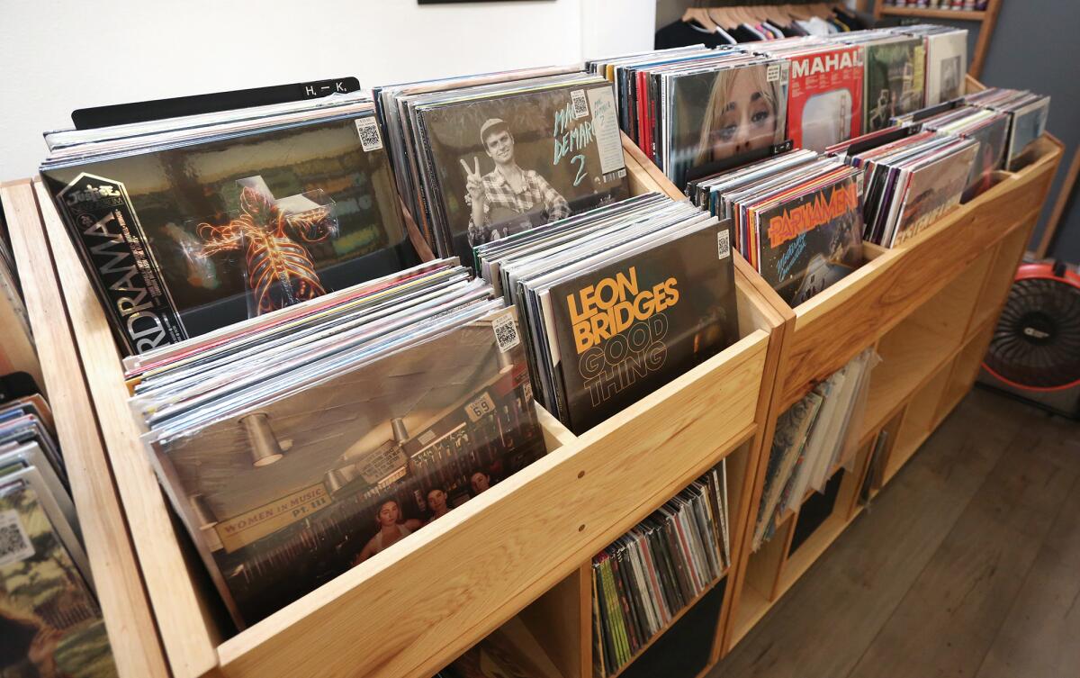 Album bins at the new indie record store Resident Vinyl inside Contra Coffee in Old Towne Orange.