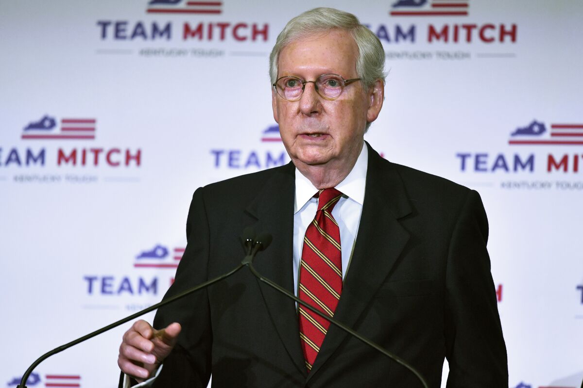 Senate Majority Leader Mitch McConnell, R-Ky., speaks to reporters during a press conference in Louisville, Ky., Wednesday, Nov. 4, 2020. McConnell secured a seventh term in Kentucky, fending off Democrat Amy McGrath. (AP Photo/Timothy D. Easley)