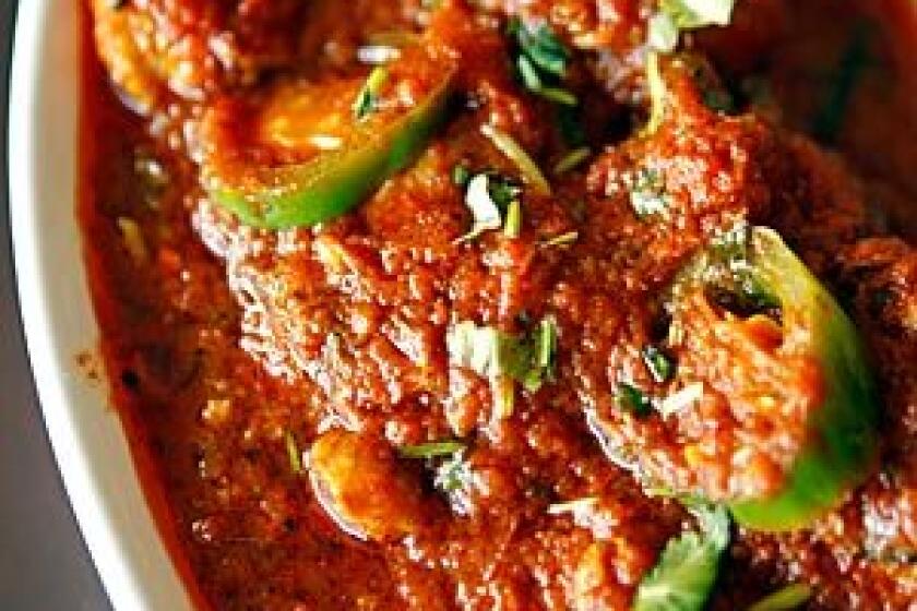 Chicken Karahi -- a mild curry dish with cooked tomatoes -- is on the menu at Red Chili.