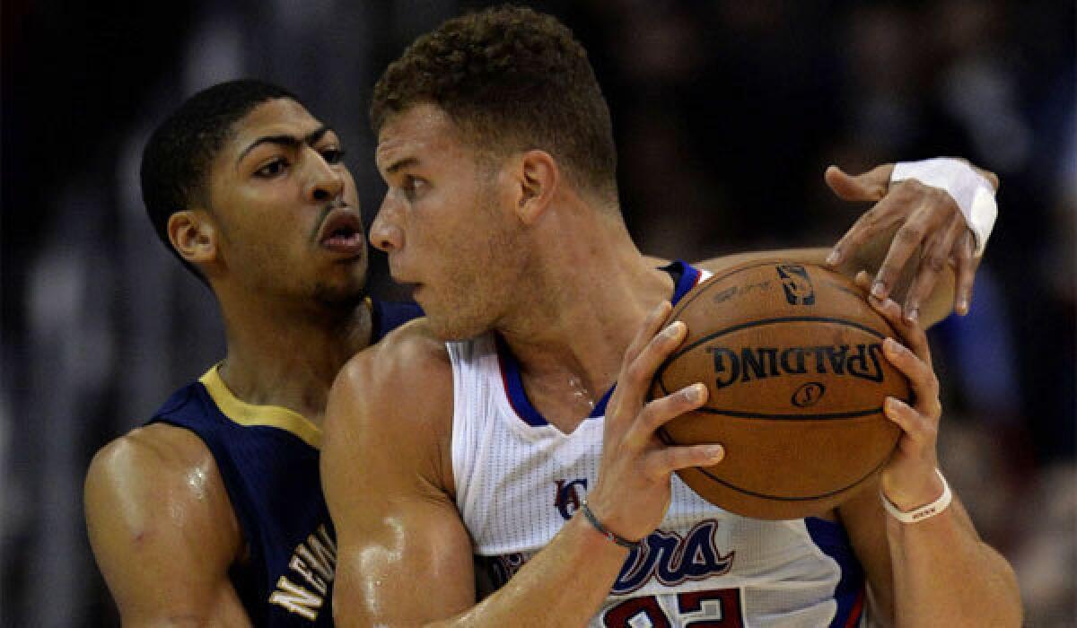 The Clippers' Blake Griffin takes on New Orleans' Anthony Davis in December at Staples Center.
