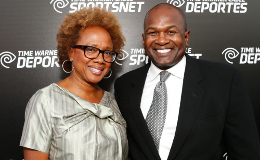 Sparks Chairman and owner Paula Madison and her husband Roosevelt Madison arrive at the Time Warner Cable Sports Net launch event in Oct. 2012. Paula Madison has informed the WNBA that her family is no longer in a position to continue their involvement with the Sparks.