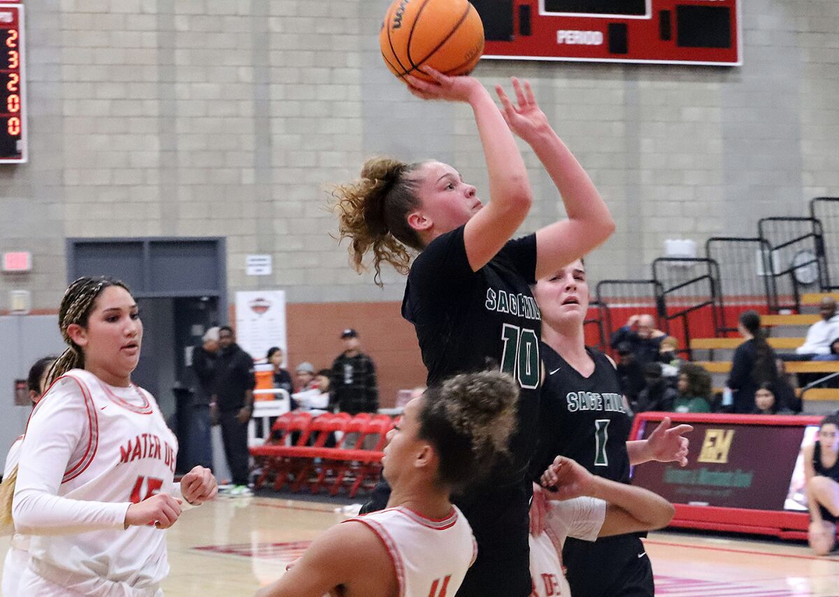 Sage Hill's Amalia Holguin (10) shoots a short jumper against Mater Dei in the Matt Denning Nike Hoops Classic on Saturday.