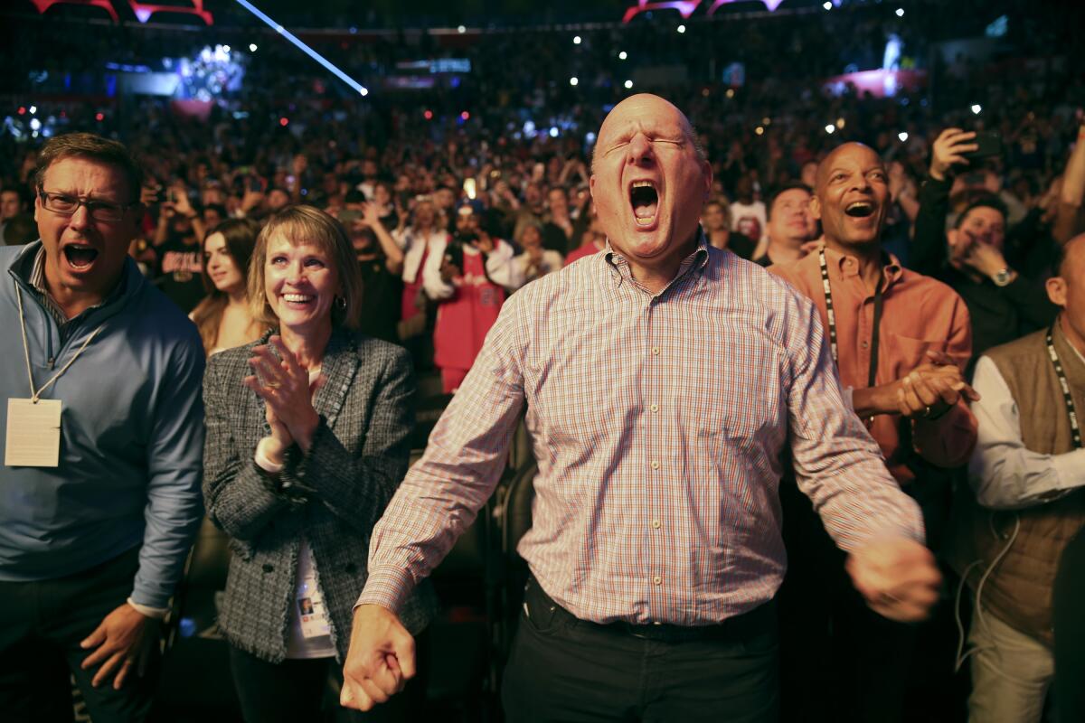 Clippers owner Steve Ballmer shows his usual untethered enthusiasm during pregame introductions before a game against the Lakers at Staples Center.