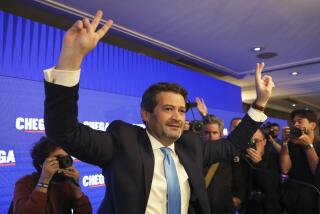 Andre Ventura, leader of populist right wing party Chega, gestures to supporters before addressing them following the announcement of results for Portugal's general election in Lisbon, Monday, March 11, 2024. (AP Photo/Joao Henriques)