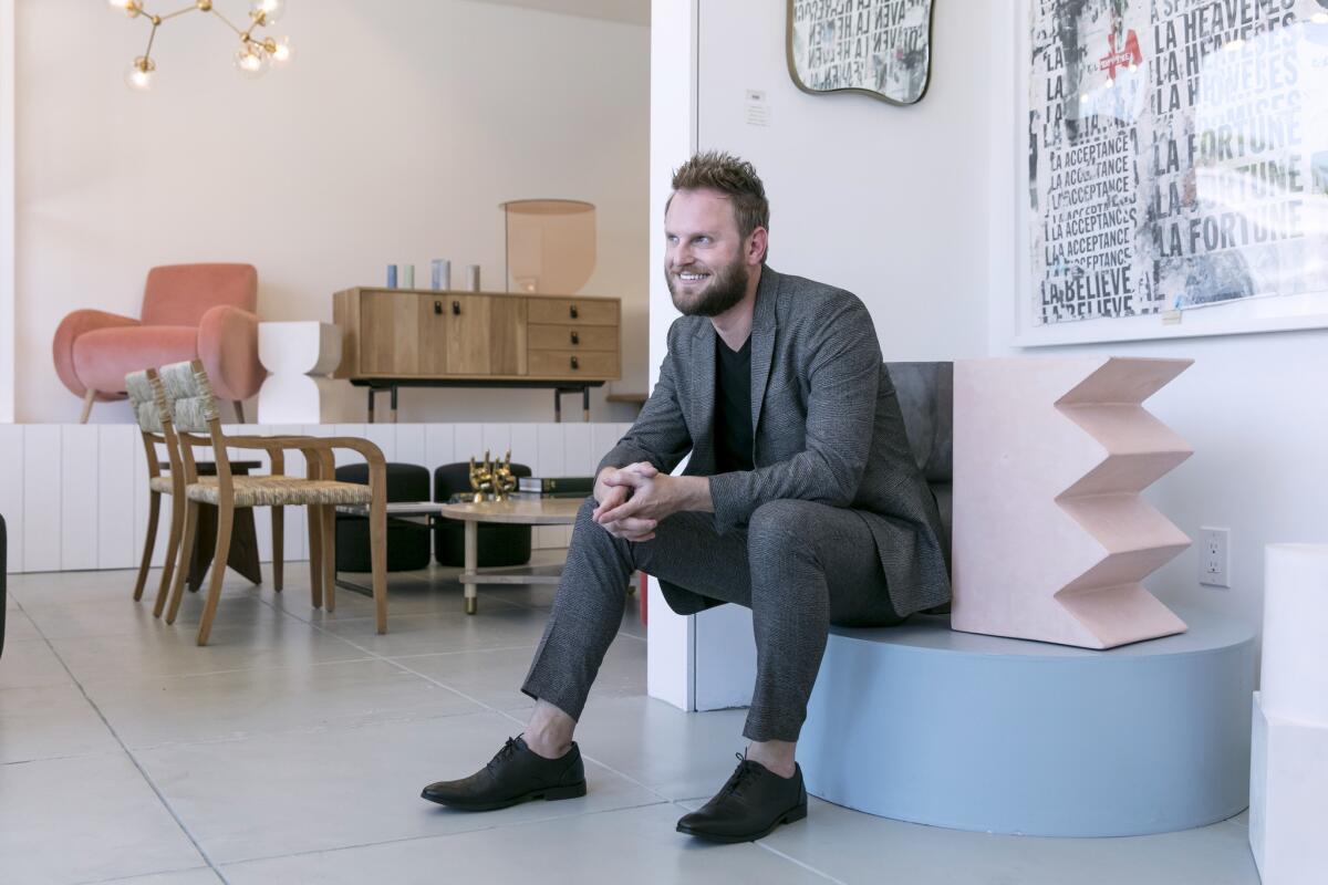 Bobby Berk inside Consort, an interior design service and store on Melrose Avenue.