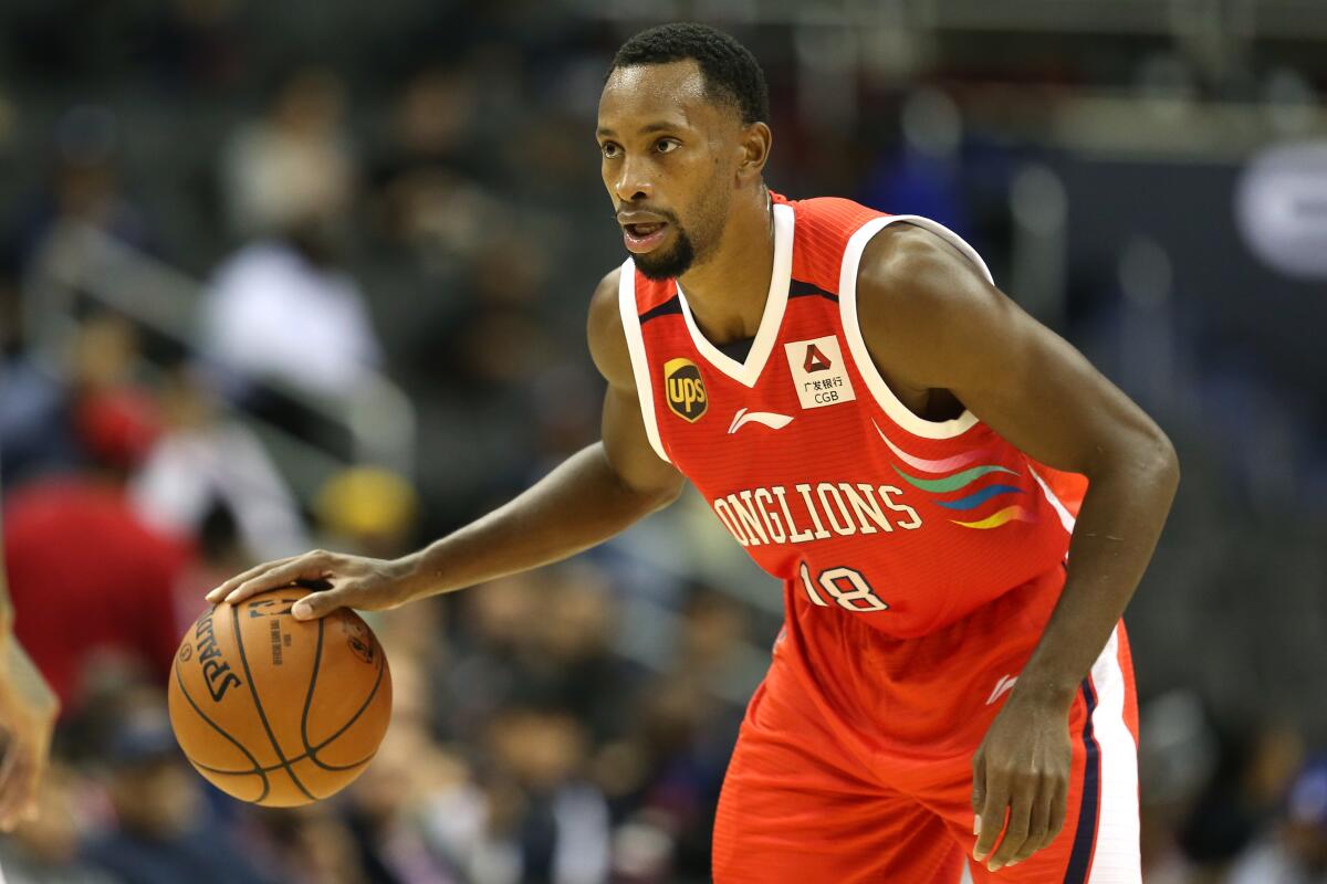 Kyle Fogg brings the ball up court for the Guangzhou Long-Lions during an exhibition game against the Washington Wizards on Oct. 12, 2018.