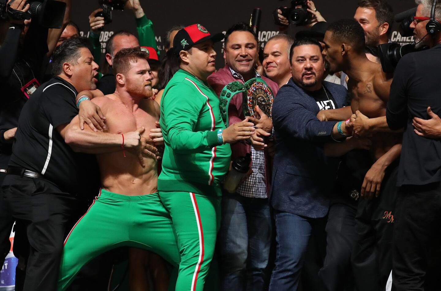 LAS VEGAS, NEVADA - MAY 03: Canelo Alvarez and Daniel Jacobs get into a shoving match during their official weigh in at T-Mobile Arena on May 3, 2019 in Las Vegas, Nevada. Alvarez and Jacobs will fight to unify the WBC WBA and IBF Titles on May 04, 2019 at T-Mobile Arena. (Photo by Al Bello/Getty Images) ** OUTS - ELSENT, FPG, CM - OUTS * NM, PH, VA if sourced by CT, LA or MoD **
