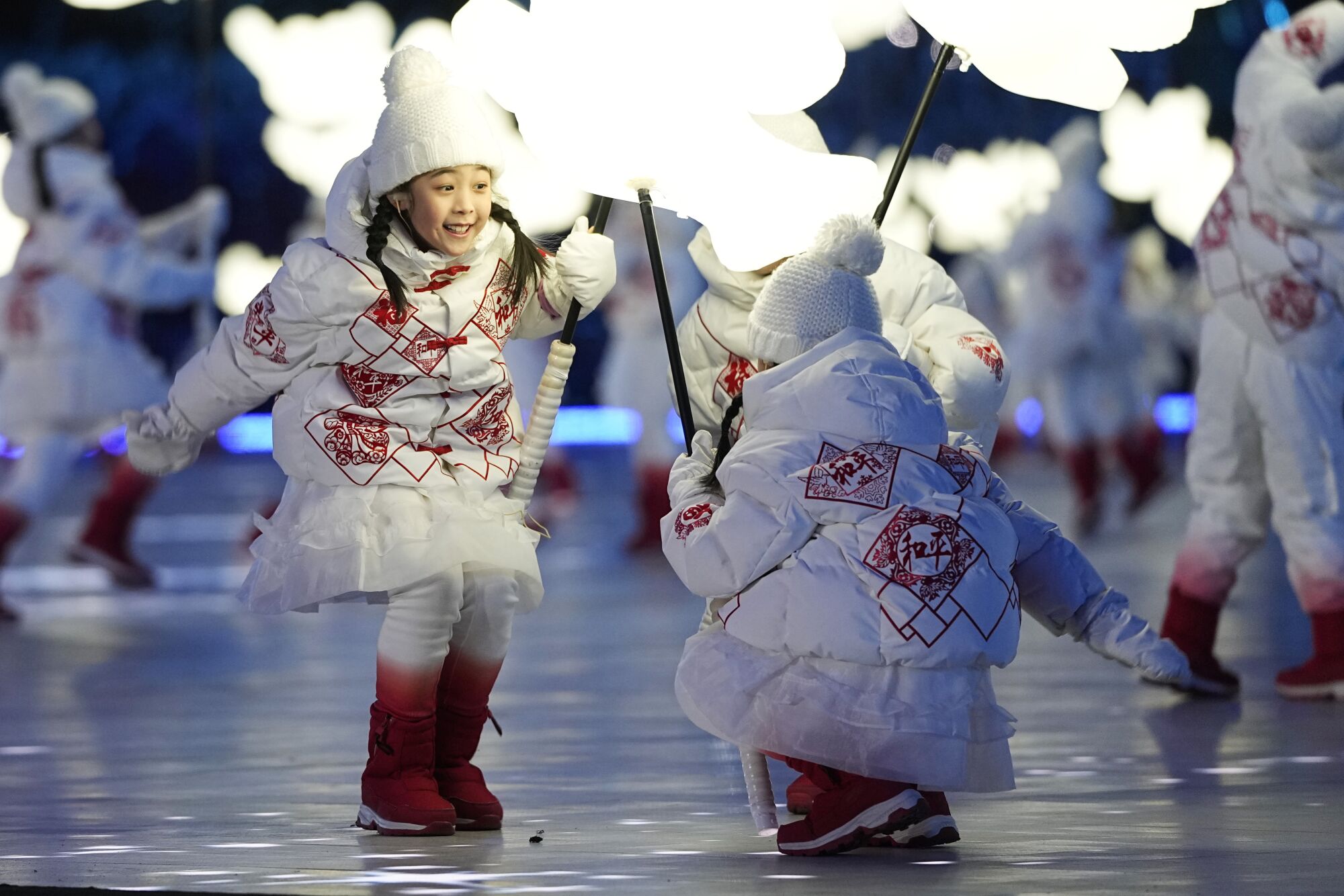 Hundreds of children perform in a segment called "The Snowflake."