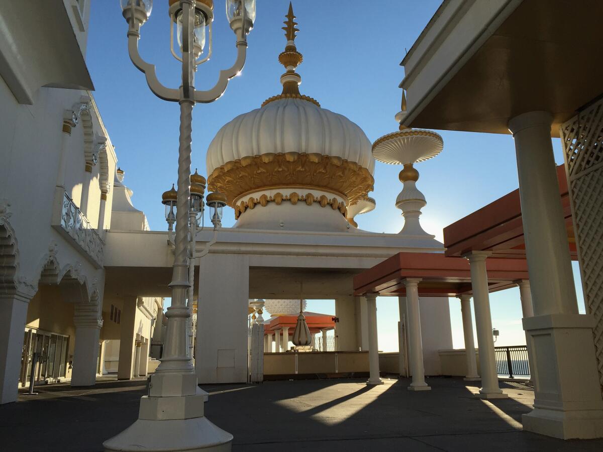 ATLANTIC CITY, NJ - AUGUST 28: The Trump Taj Mahal casino sits along the boardwalk on August 28, 2015 in Atlantic City, New Jersey. New casinos in neighboring states have drawn much of Atlantic City's visitors away, and in 2014 some 8,000 people were layed-off when four of the city's major casinos closed. The closures brought Atlantic City's unemployment rate to more than 11 percent, double the national average. The mass unemployment has produced the highest foreclosure rate of any metropolitan U.S. area, with 1 out of 113 homes now in foreclosure in Atlantic County. (Photo by John Moore/Getty Images) ** OUTS - ELSENT, FPG - OUTS * NM, PH, VA if sourced by CT, LA or MoD **