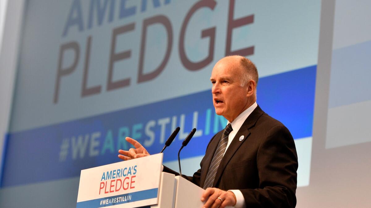 California Gov. Jerry Brown speaks in the U.S. Climate Action Center at the COP 23 Climate Change Conference on Saturday in Bonn.
