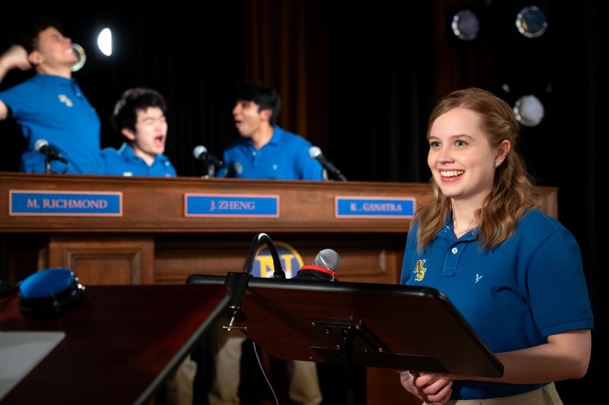 Angourie Rice as Cady Heron, foreground, alongside Alexis Frias, Ben Wang and Mahi Alam in "Mean Girls."