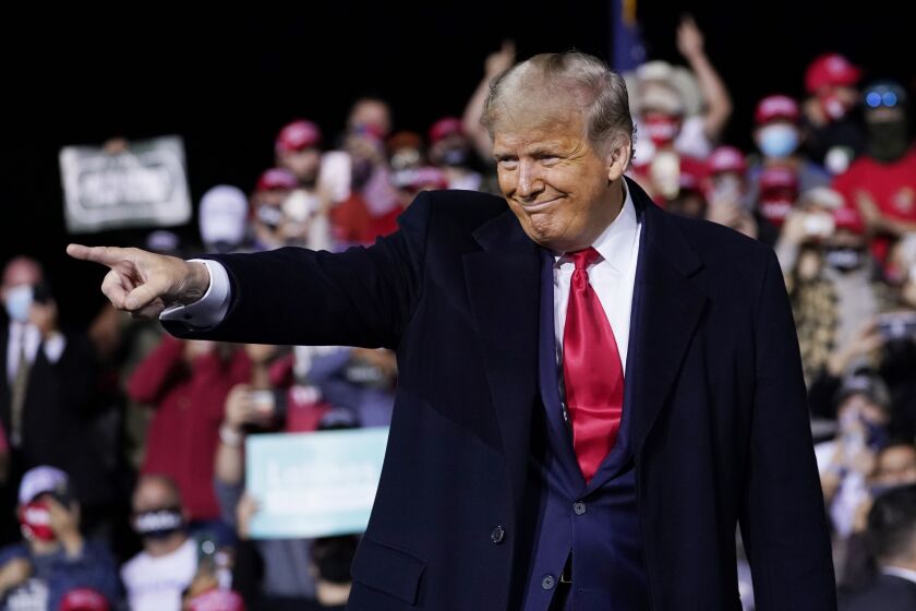 President Donald Trump wraps up his speech at a campaign rally at Fayetteville Regional Airport, Saturday, Sept. 19, 2020, in Fayetteville, N.C. (AP Photo/Evan Vucci