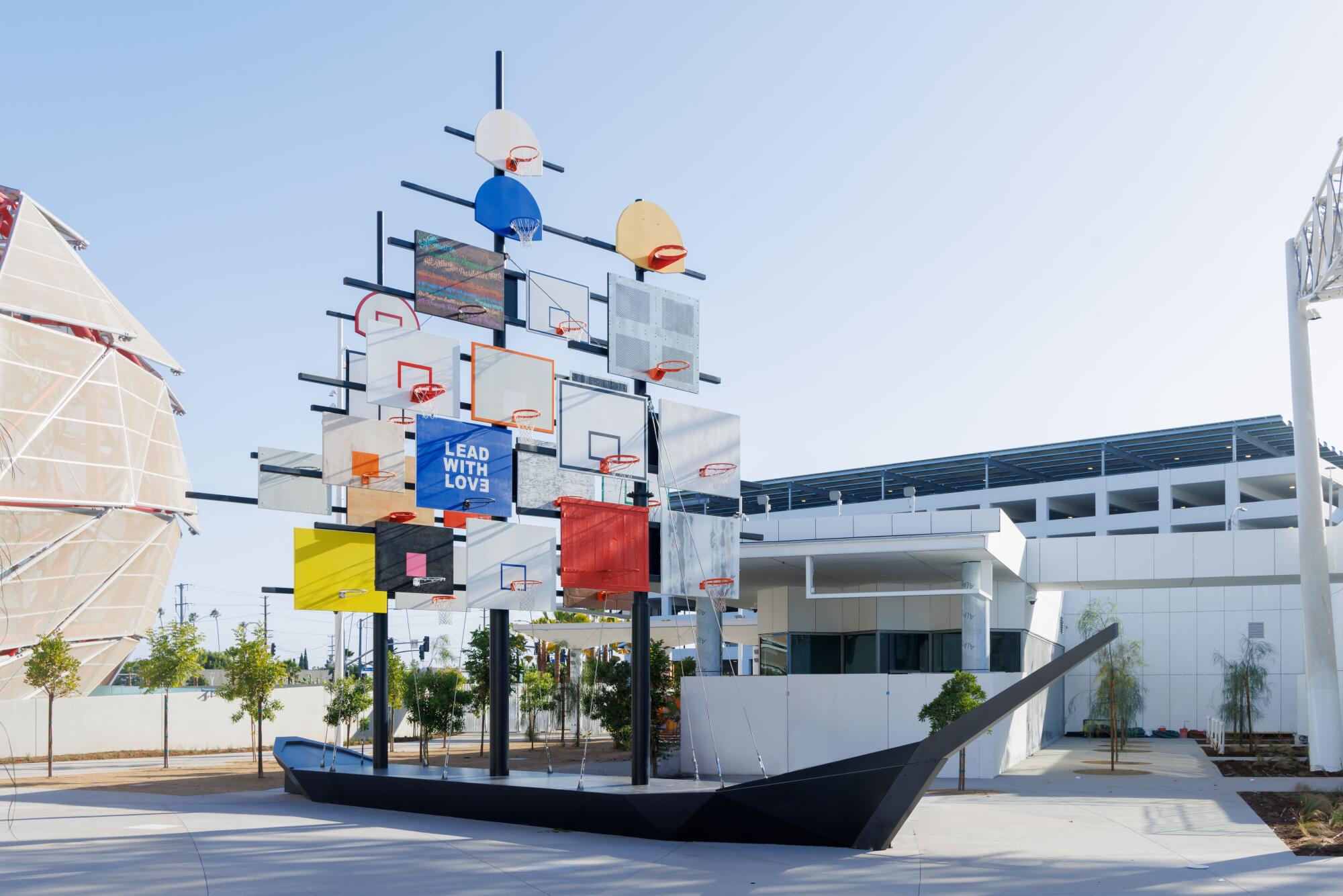 Artist Glenn Kaino's "Sails" looks like an old clipper ship with sails constructed of assorted basketball backboards.