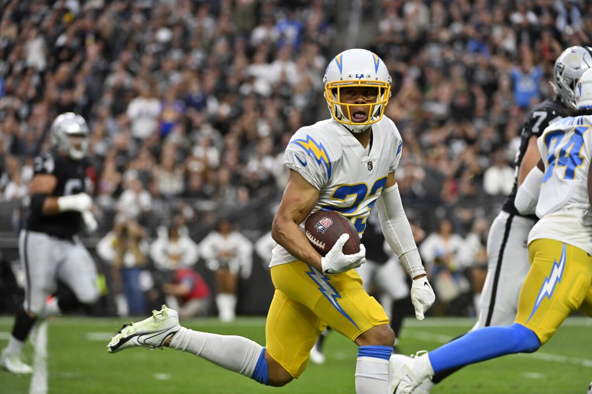 Chargers cornerback Bryce Callahan scores on an interception return in the first quarter.
