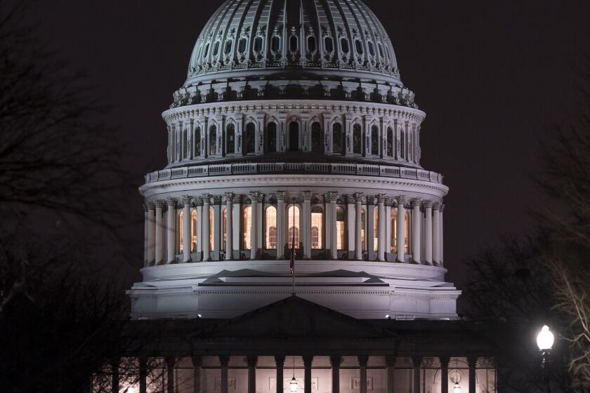 The Capitol is seen Wednesday evening as the House of Representatives works to approve the Respect for Marriage Act, a bill already passed in the Senate to codify both interracial and same-gender marriage, in Washington, Dec. 7, 2022. (AP Photo/J. Scott Applewhite)