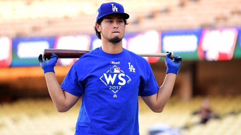 Dodgers pitcher Yu Darvish on the field during batting practice ahead of the World Series at Dodger Stadium on Monday.