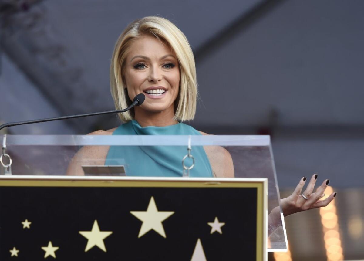 In this file photo, Kelly Ripa addresses the crowd during a ceremony in October 2015 honoring her with a star on the Hollywood Walk of Fame in Los Angeles.