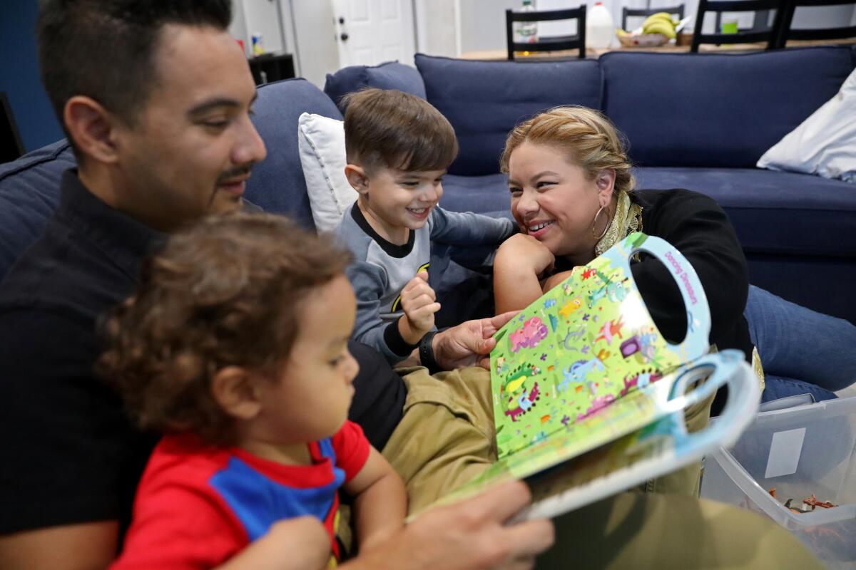Natalie Chavez and husband Eduardo Chavez, raising their two children