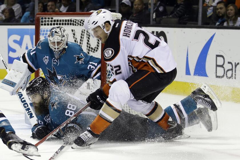 San Jose Sharks defenseman Brent Burns (88) gets in front of a shot from Anaheim Ducks forward Shawn Horcoff (22) during the second period of a game on Nov. 7.
