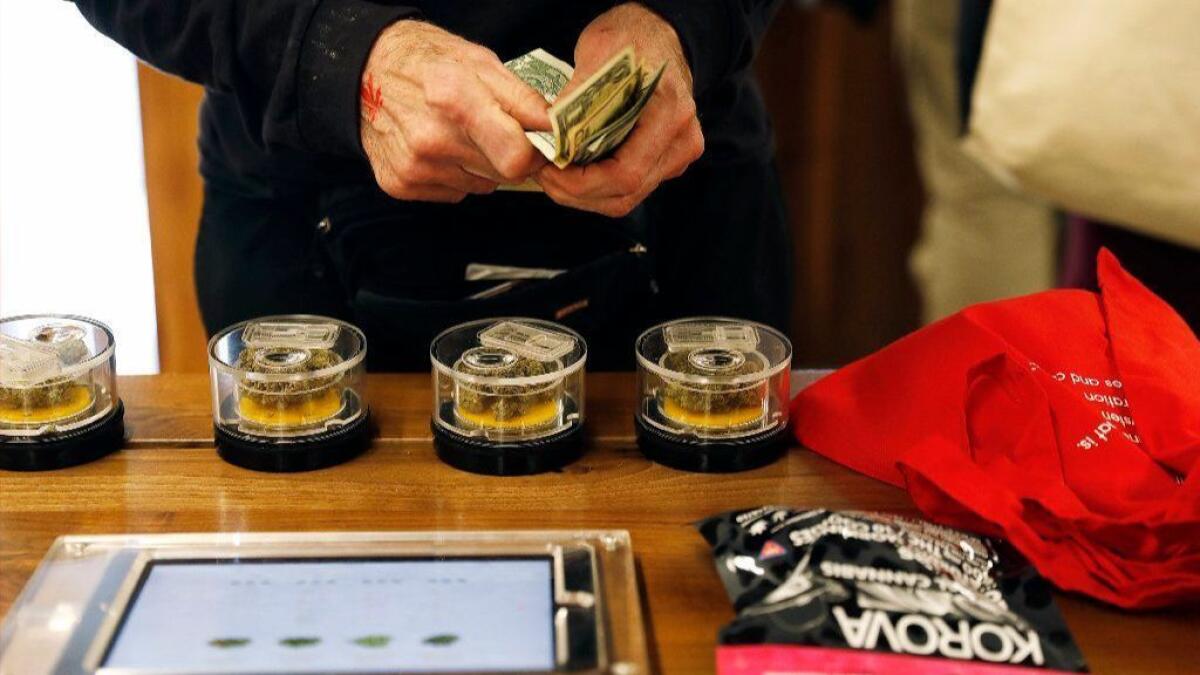 A customer shops at marijuana dispensary MedMen in West Hollywood in January. Berkeley may be the first city to declare itself a cannabis sanctuary city.