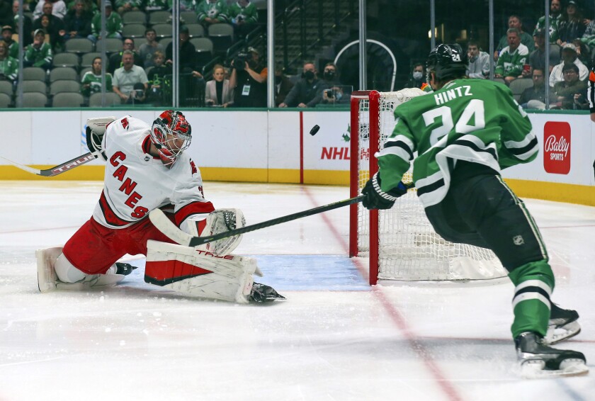 Carolina Hurricanes goaltender Frederik Andersen (31) reacts as Dallas Stars left wing Roope Hintz (24) scores a goal in the first period of an NHL hockey game Tuesday, Nov. 30, 2021, in Dallas. (AP Photo/Richard W. Rodriguez)
