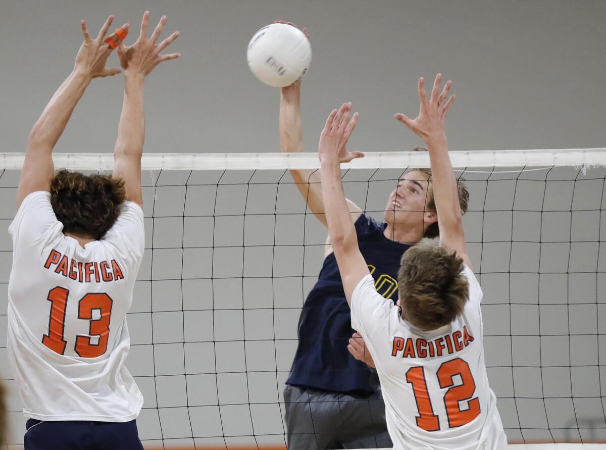 Marina's Daniel Purtell (10) kills the ball past Pacifica Christian during a CIF Southern Section Division 4 quarterfinal.
