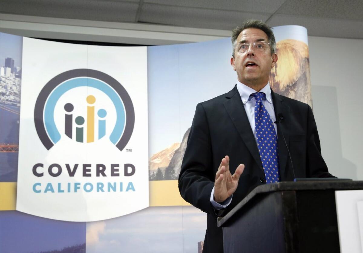 Peter Lee, executive director of Covered California, discusses enrollment in the exchange during a talk in November.