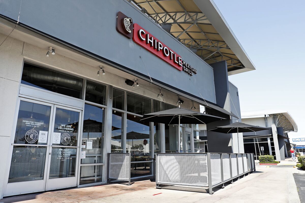 The Chipotle Mexican Grill along Harbor Boulevard in Costa Mesa. The Newport Beach-based company received the largest imposed fine in a food-safety case by the Department of Justice on Tuesday.