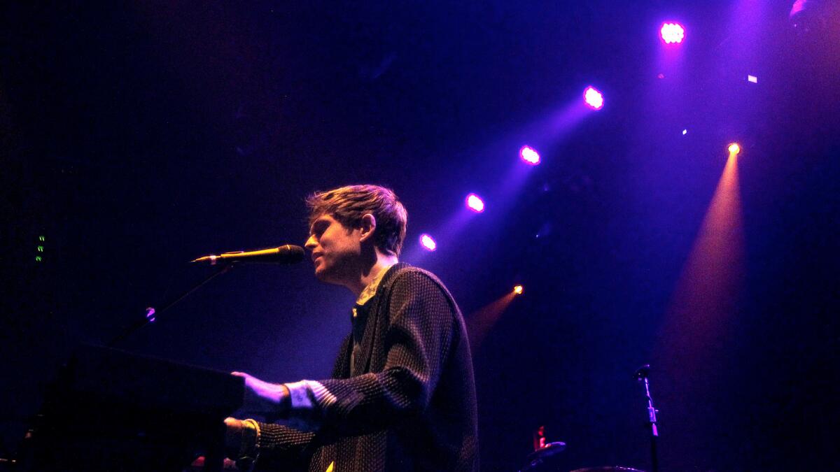 James Blake performs Monday night at the Belasco Theater in Los Angeles.