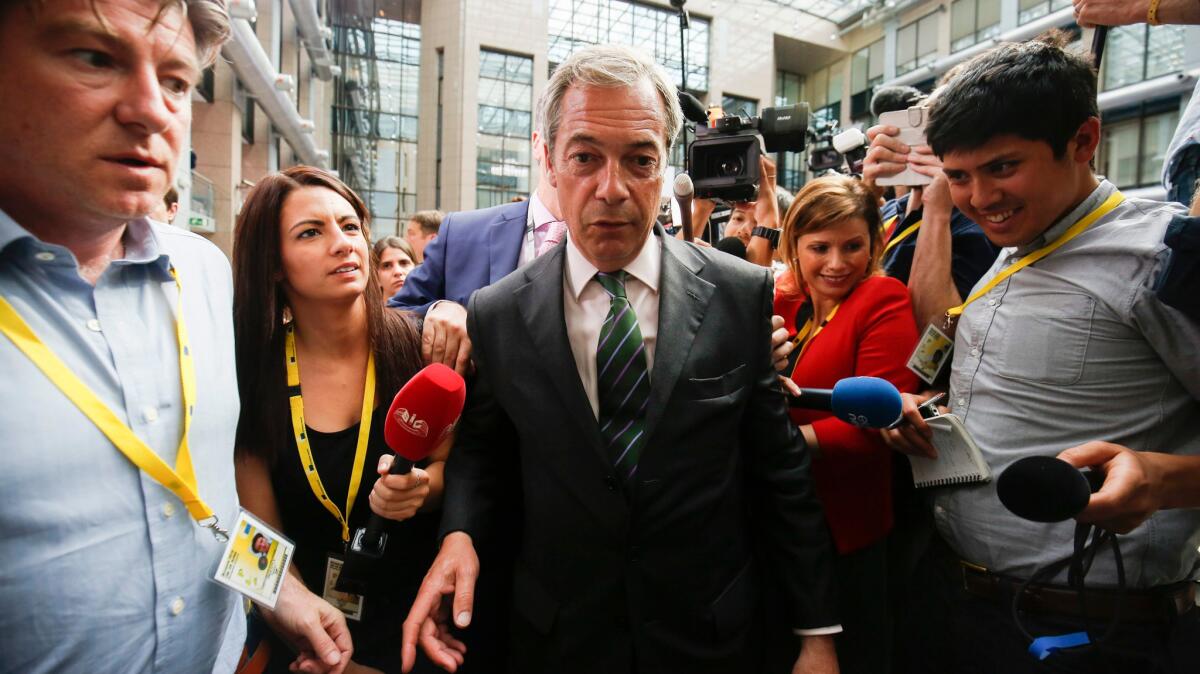 Nigel Farage, leader of the United Kingdom Independence Party (UKIP), speaks to reporters in the atrium main press room at the European Summit in Brussels, Belgium on June 28.