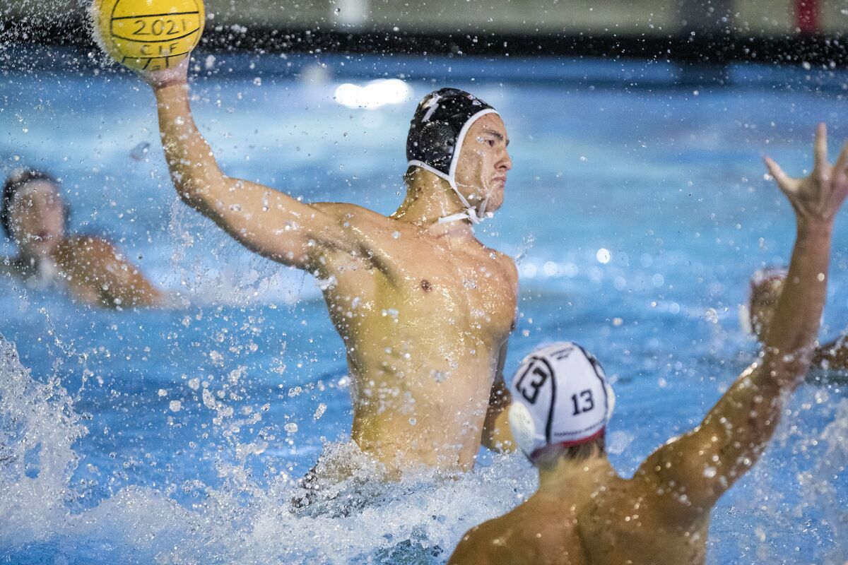 Huntington Beach's Nikola Mirkovic takes a shot during a CIF Southern Section Open Division semifinal game on Nov. 10.