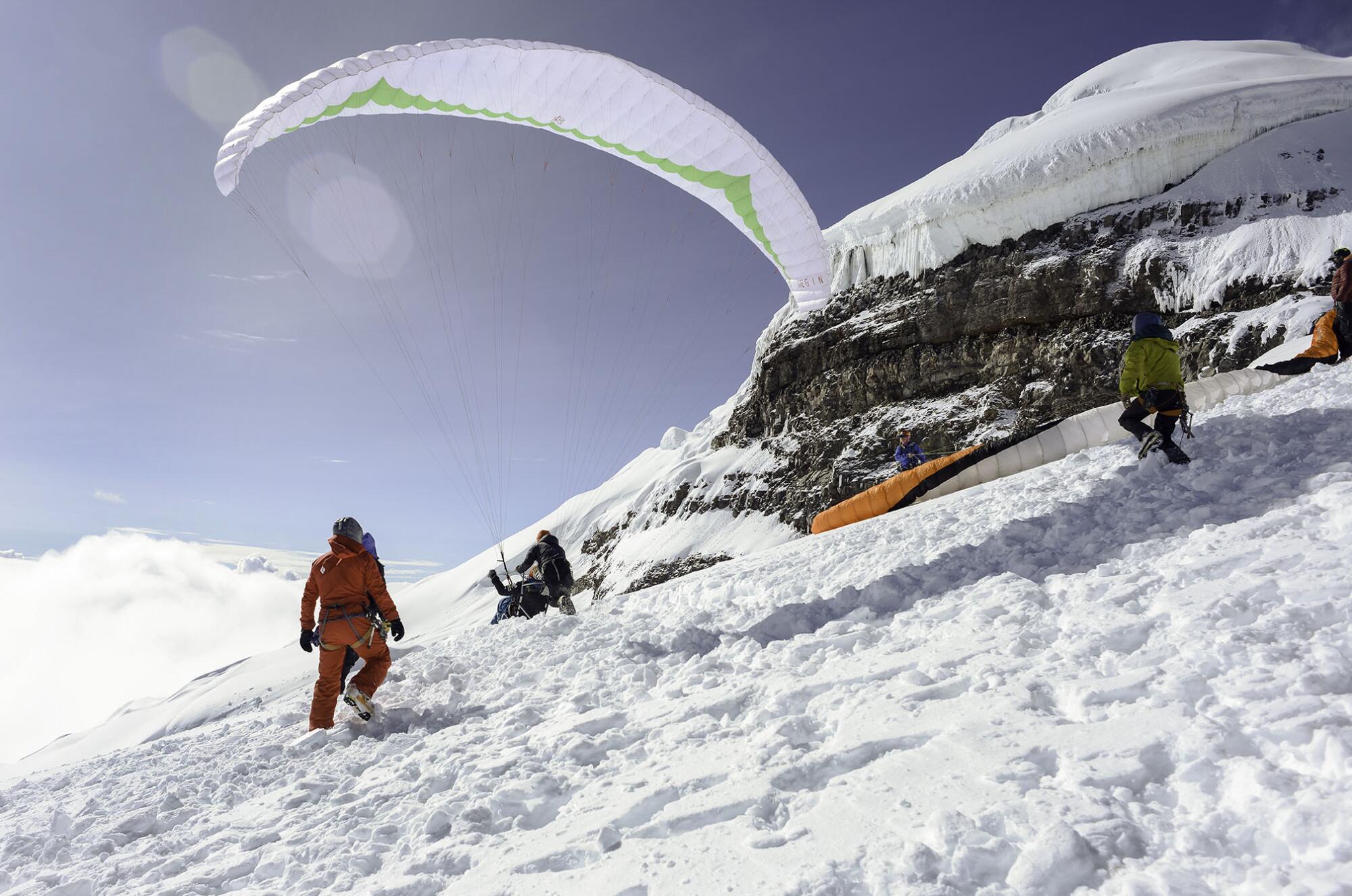 Zuko Carrasco paraglides off Cotopaxi in Ecuador.