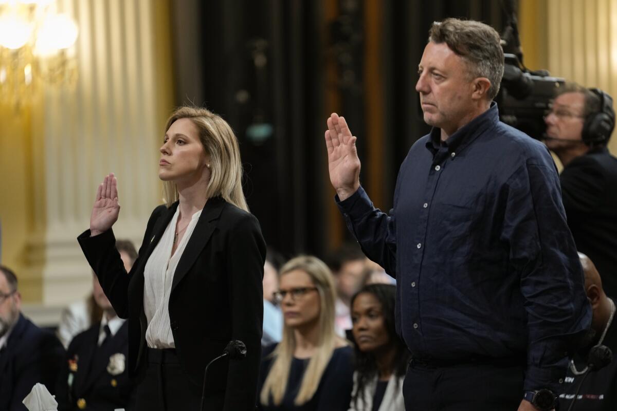 Officer Caroline Edwards and Nick Quested swearing in during the hearing on Thursday.